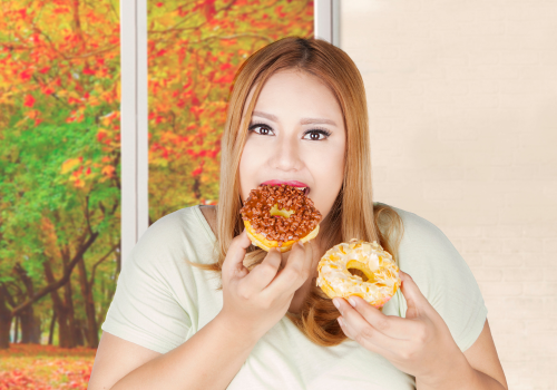 Frau isst Süßigkeiten (500 x 350 px).png