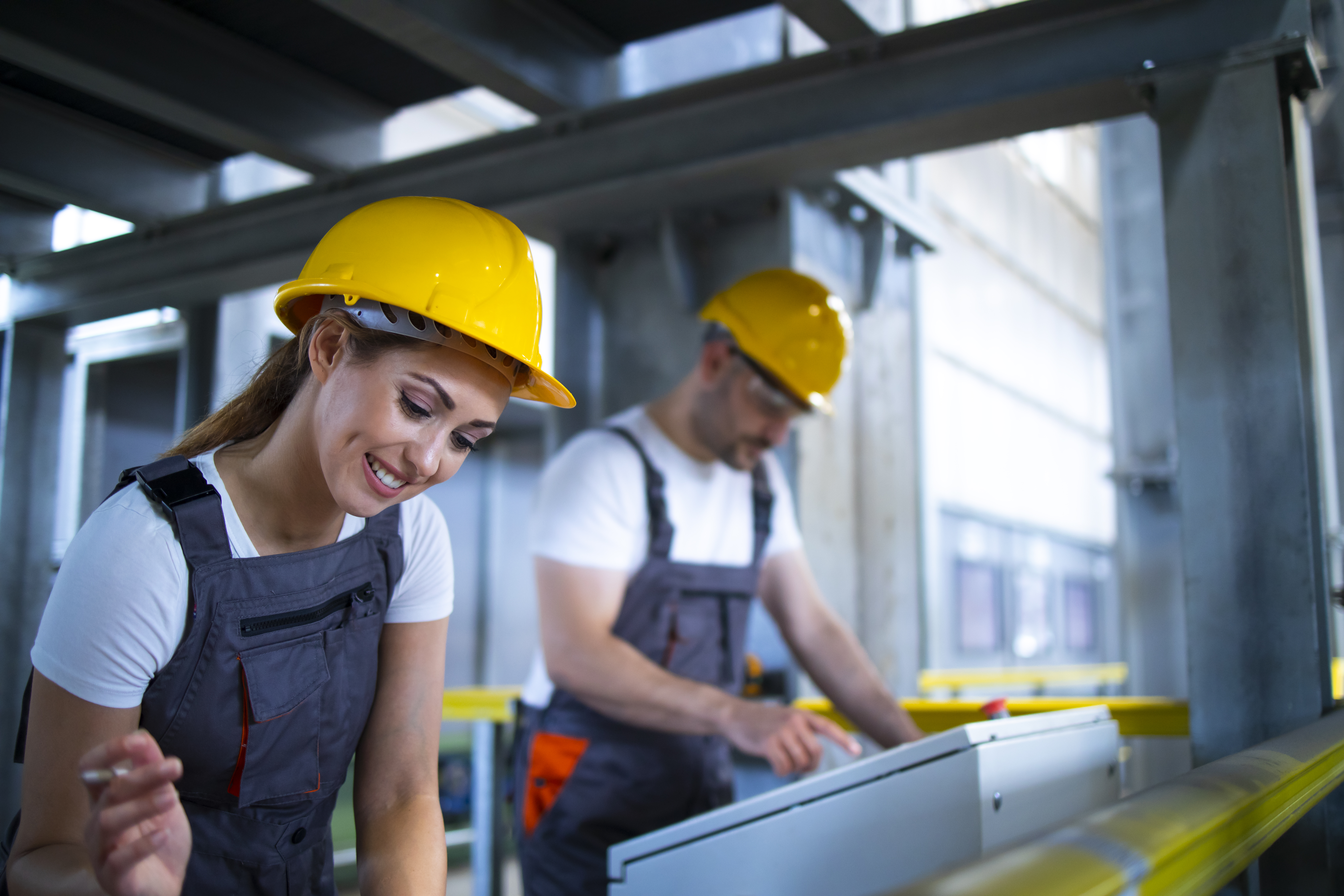 factory-workers-monitoring-industrial-machines-production-remotely-control-room.jpg