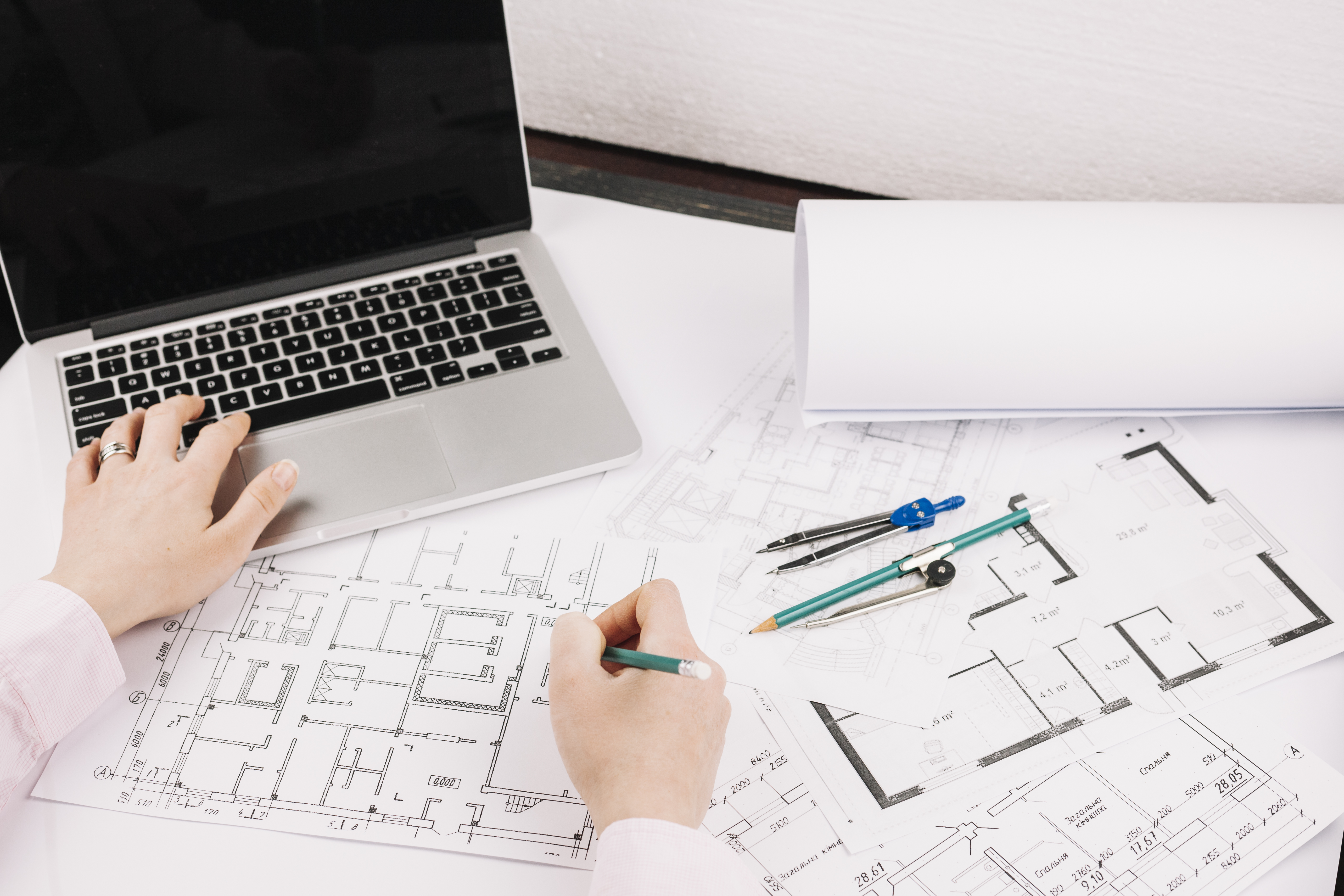 architecture-concept-with-building-plan-laptop.jpg
