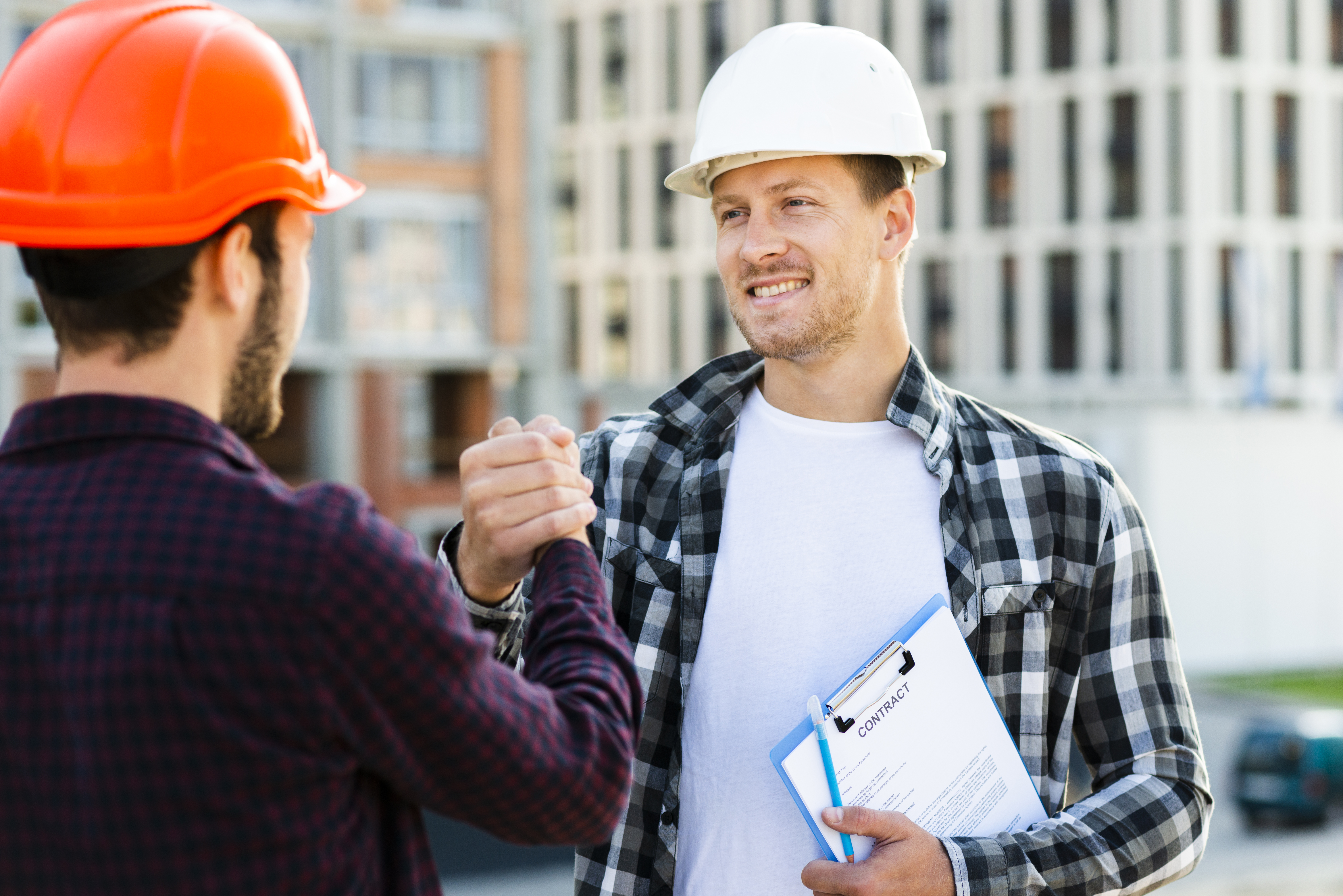 close-up-engineer-architect-shaking-hands.jpg