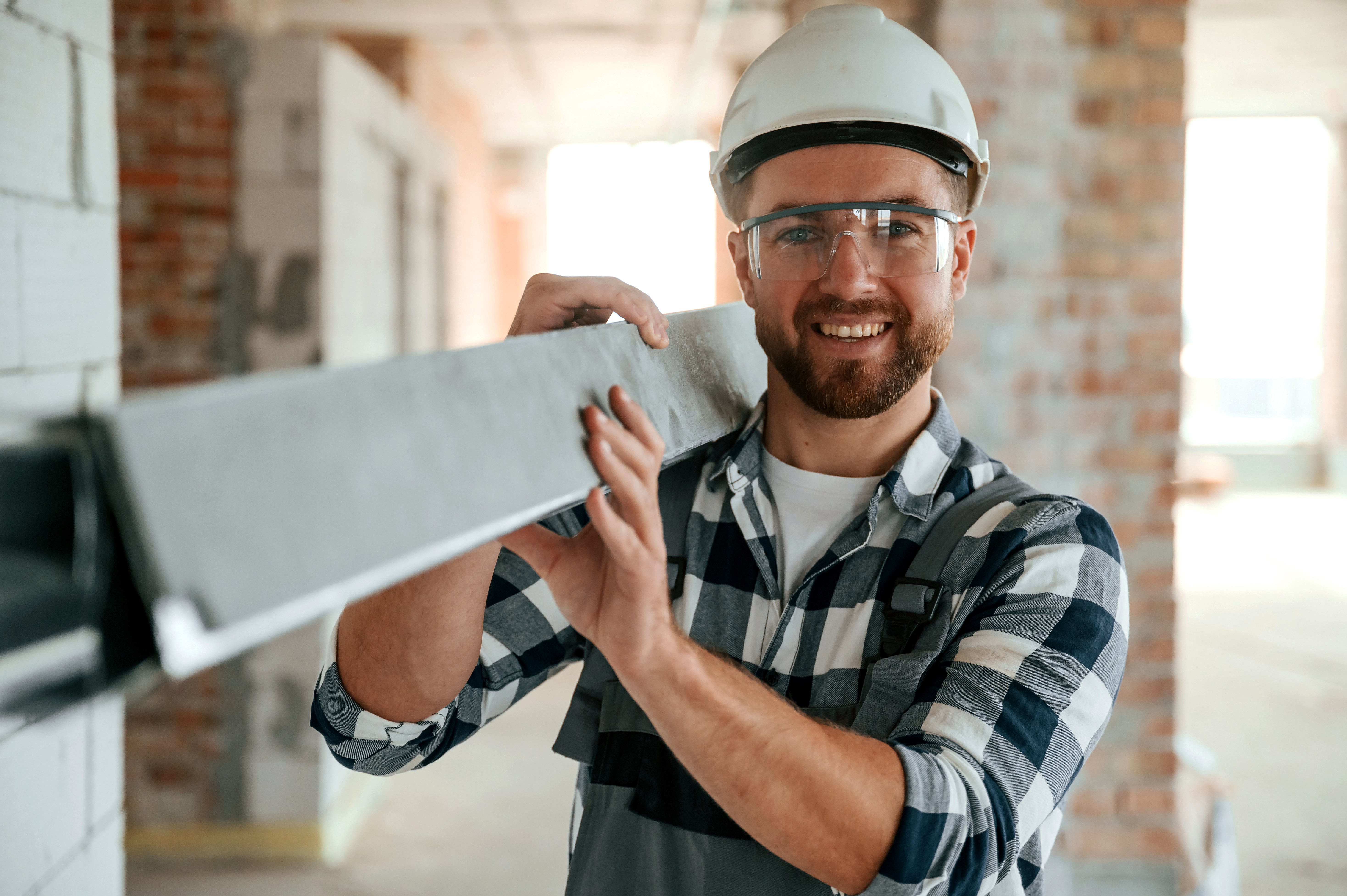 with-metal-plank-hands-construction-worker-uniform-empty-unfinished-room.jpg