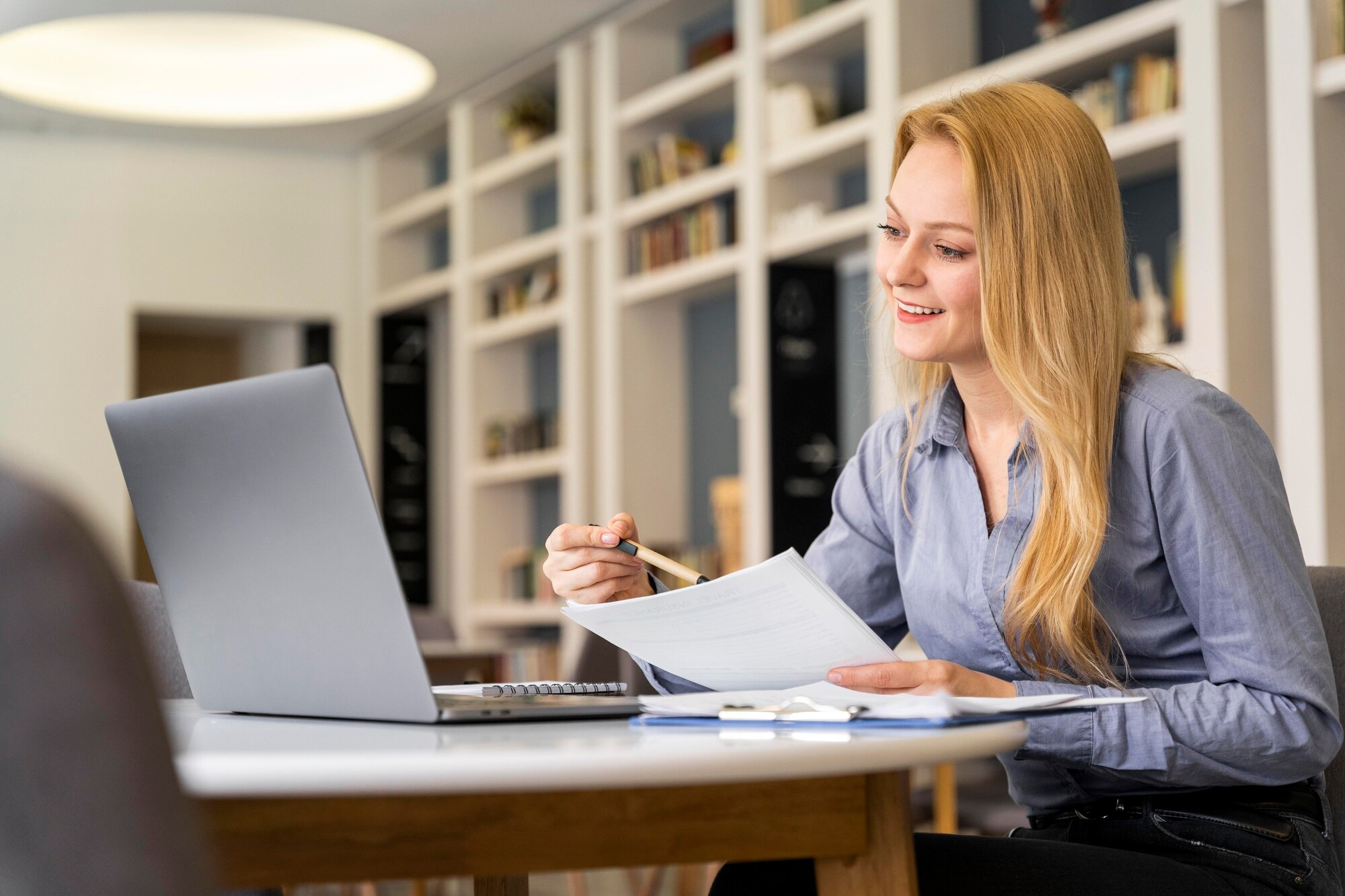 medium-shot-woman-holding-paper_23-2148938301.jpg