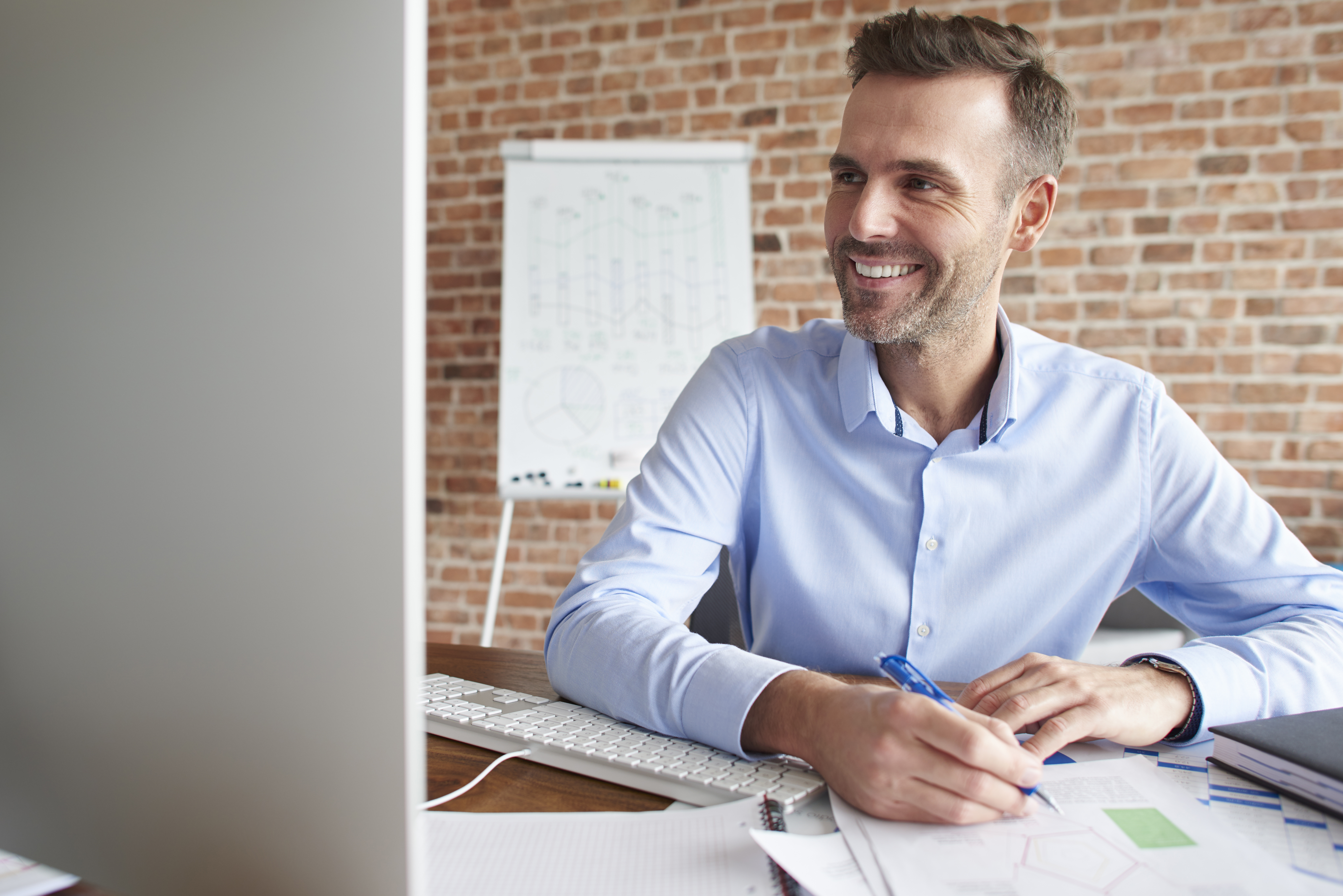 man-focused-while-working-computer.jpg