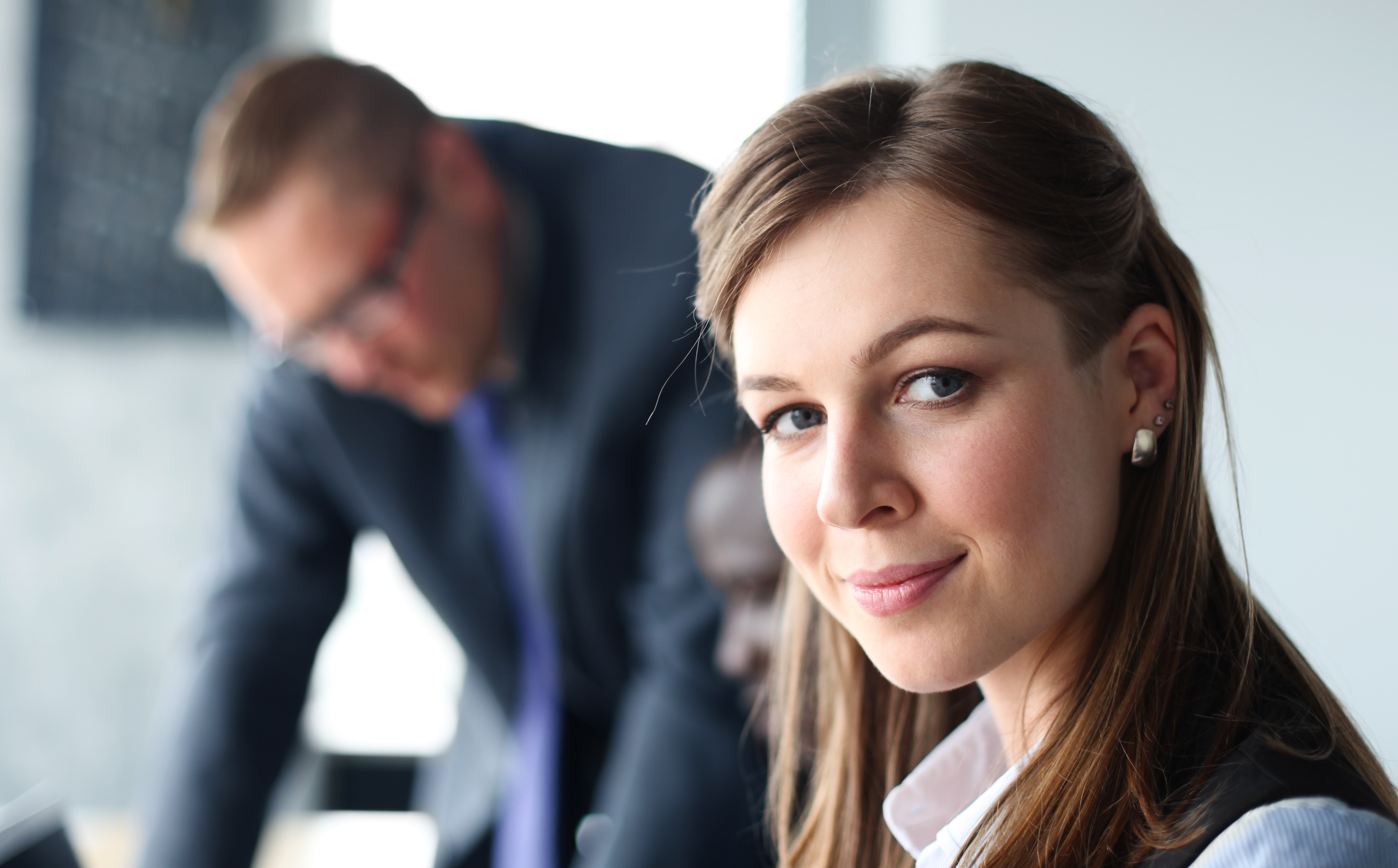 business-woman-with-her-staff-people-group-background-modern-bright-office-indoors.jpg