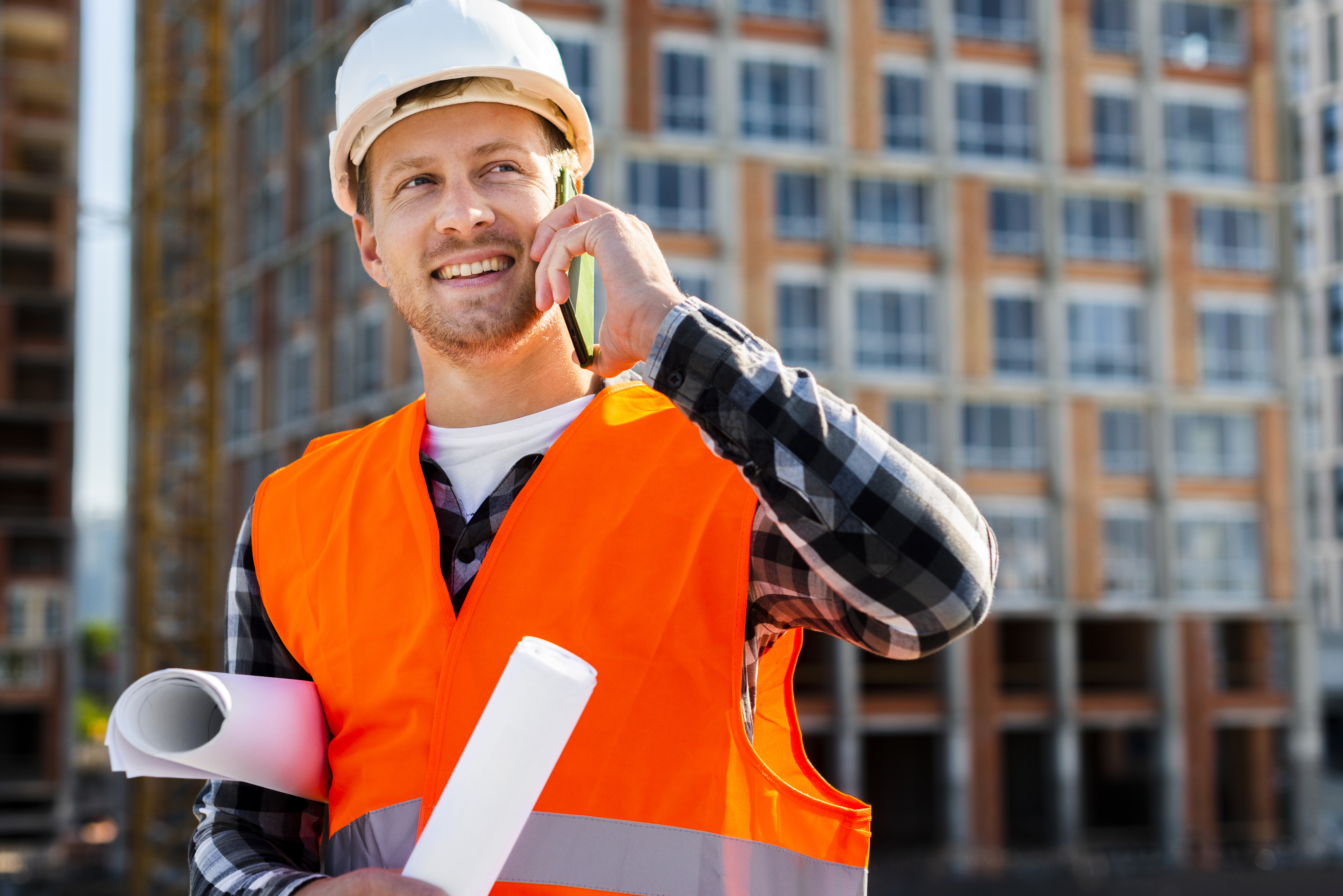 medium-shot-portrait-construction-engineer-talking-phone.jpg
