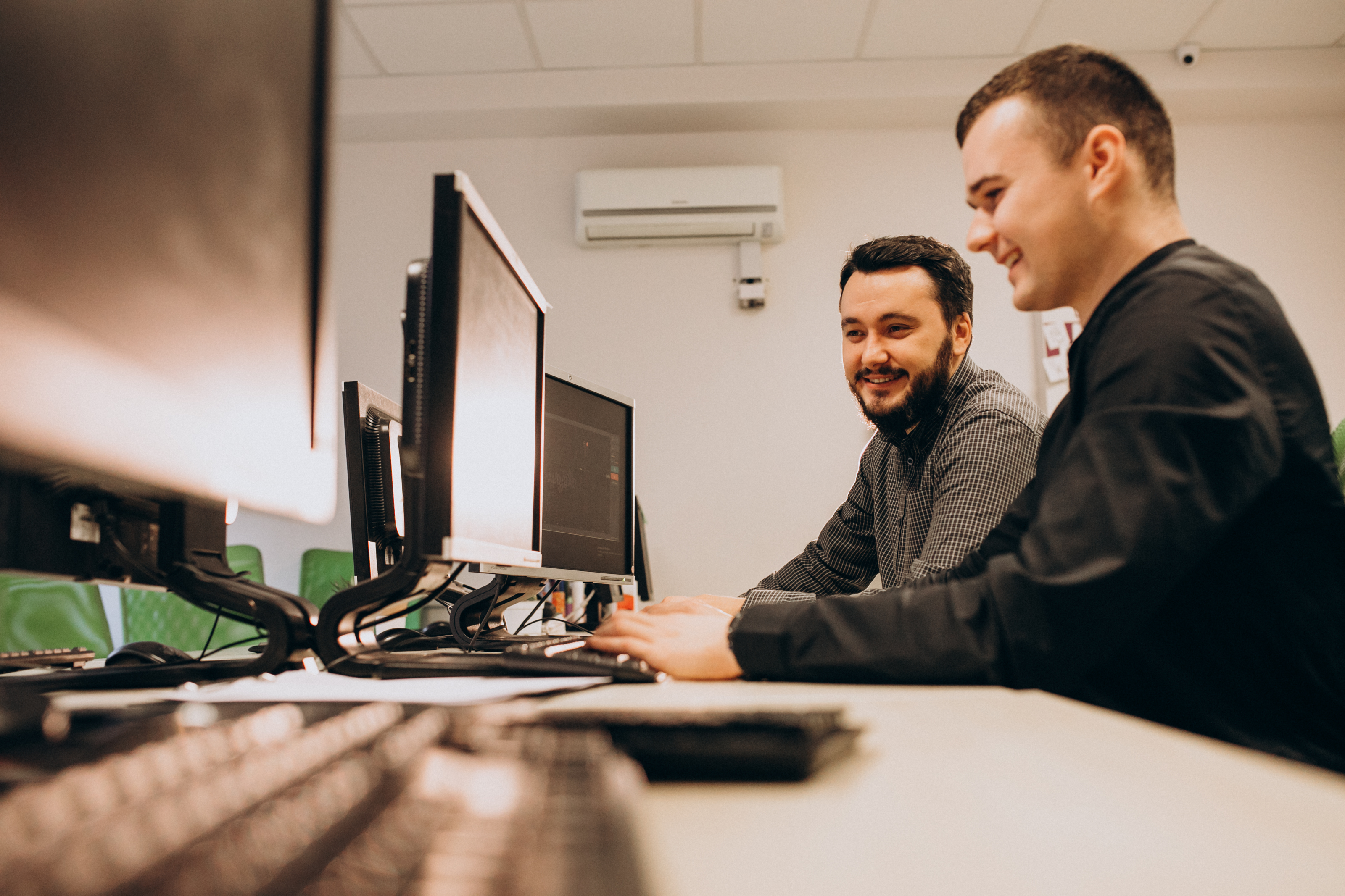 young-male-web-designers-working-computer.jpg