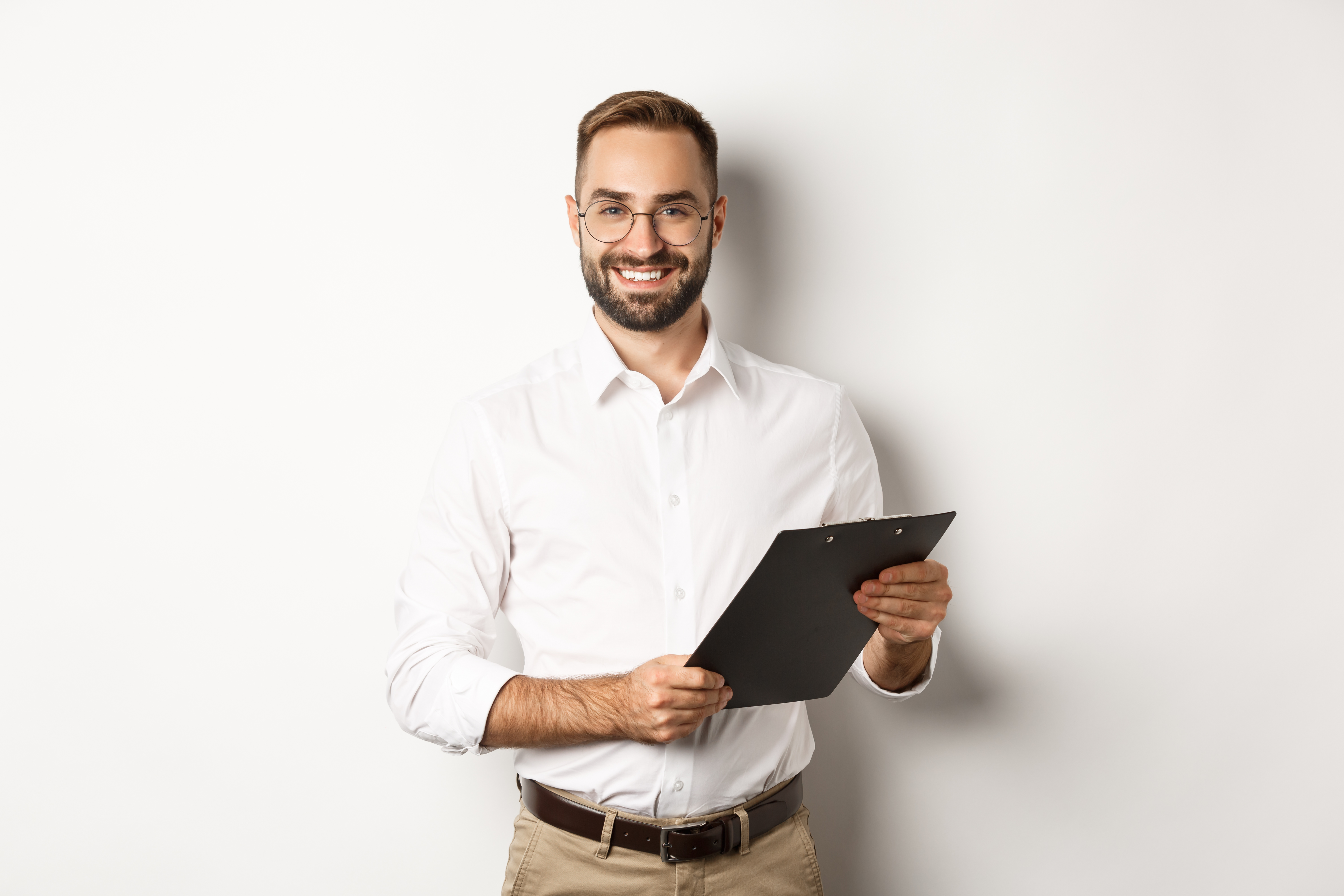 handsome-manager-glasses-working-using-clipboard-standing.jpg