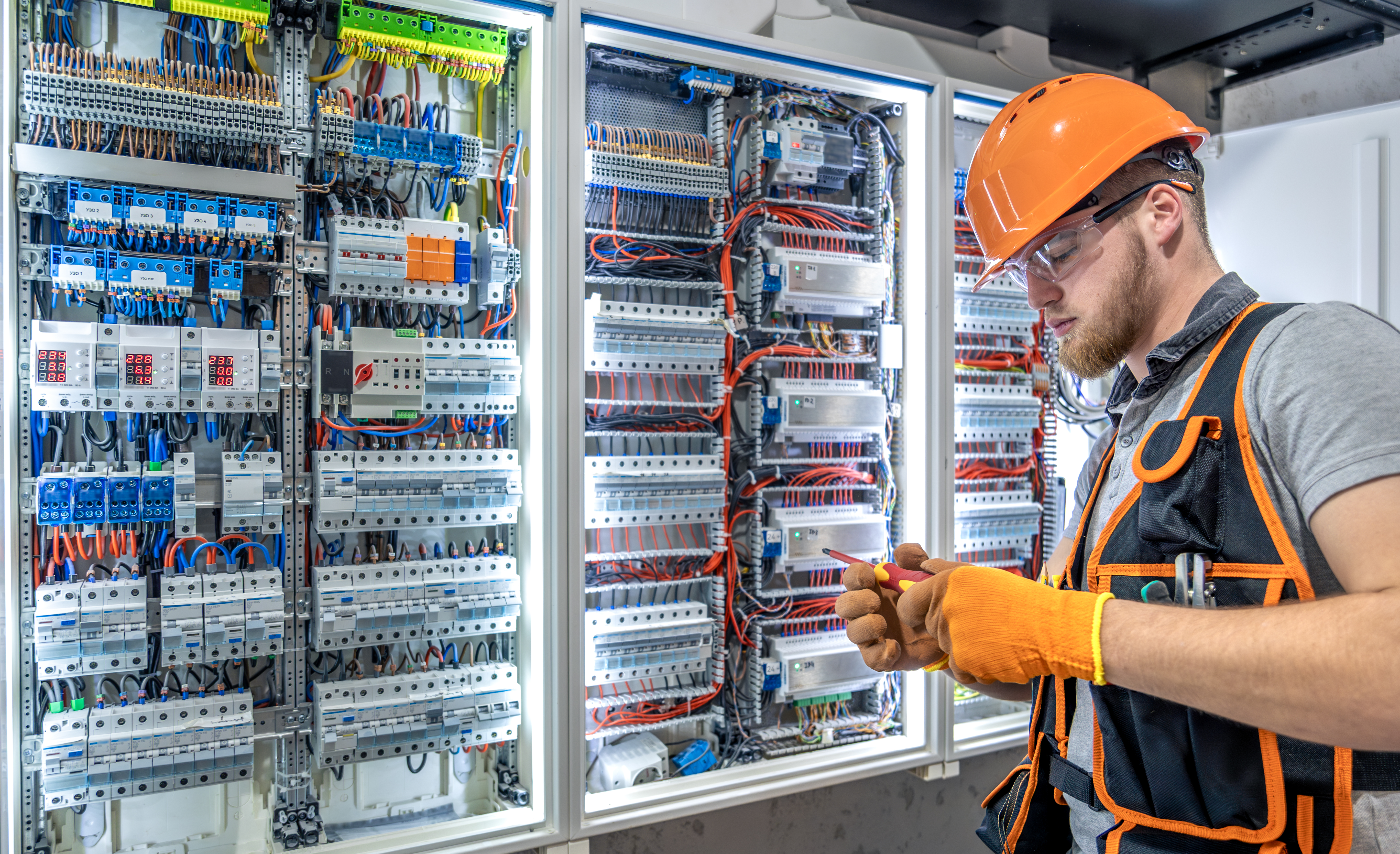 male-electrician-working-electrical-panel-male-electrician-overalls (1).jpg