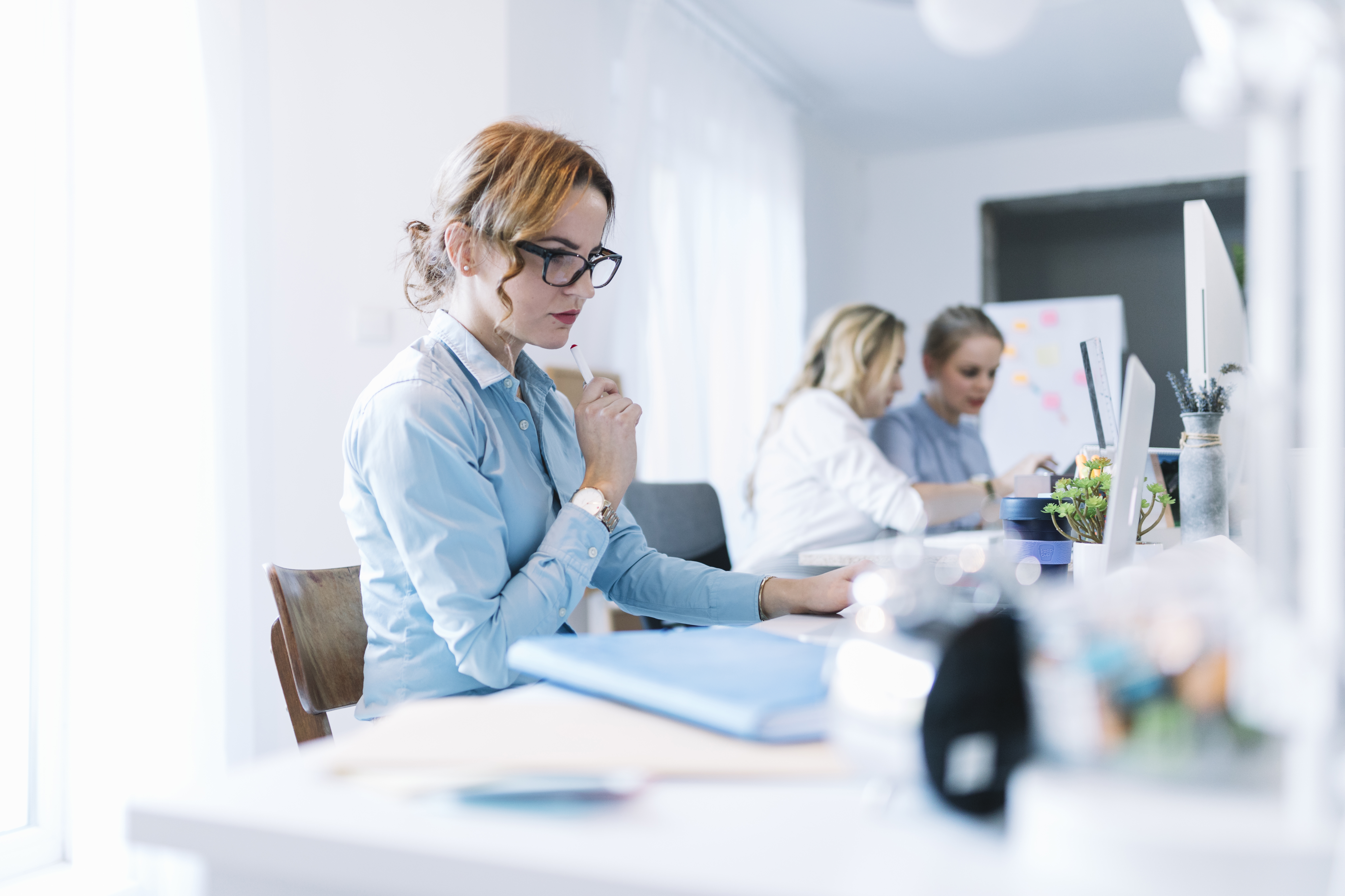 confident-young-businesswoman-working-laptop-office.jpg