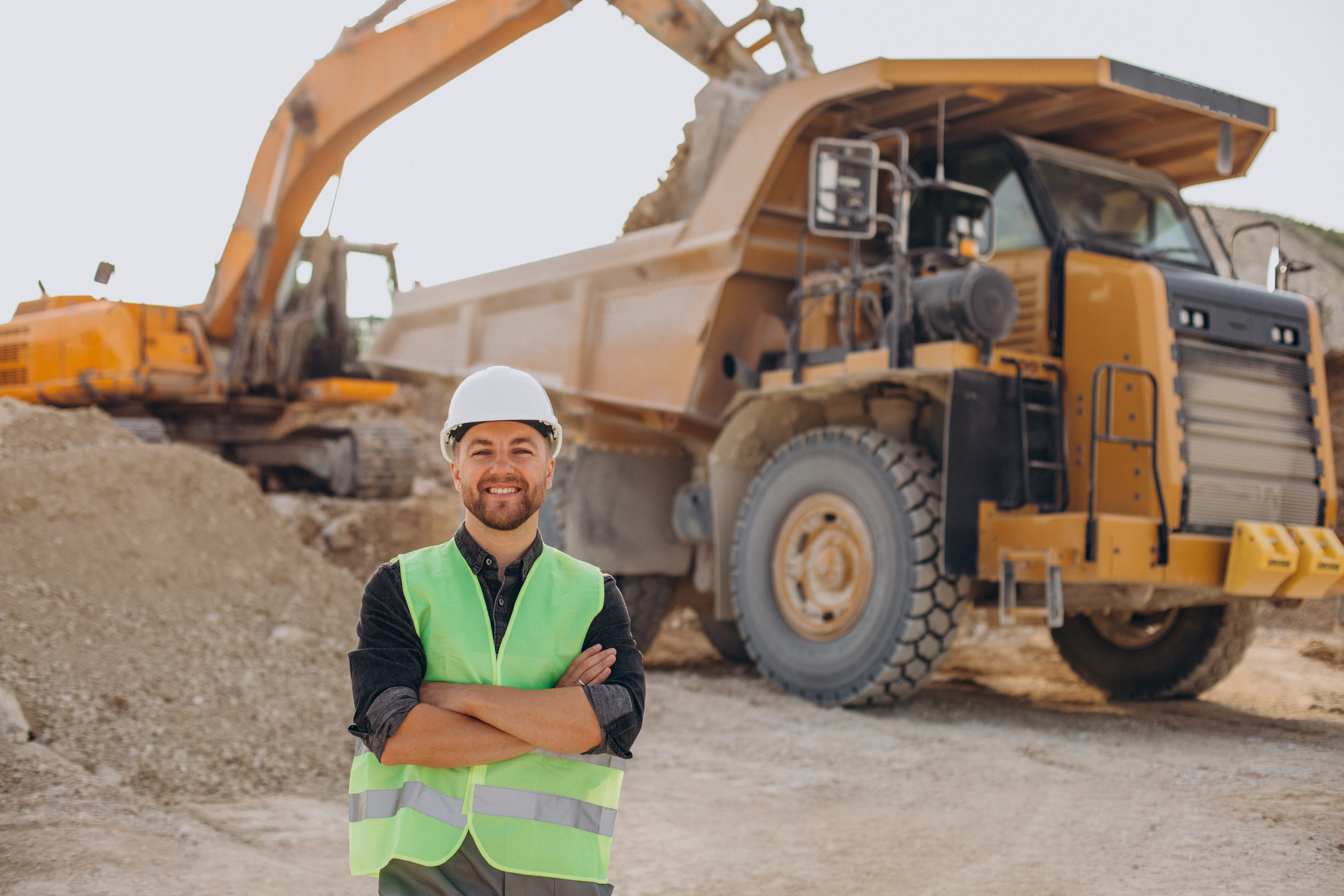 male-worker-with-bulldozer-sand-quarry.jpg