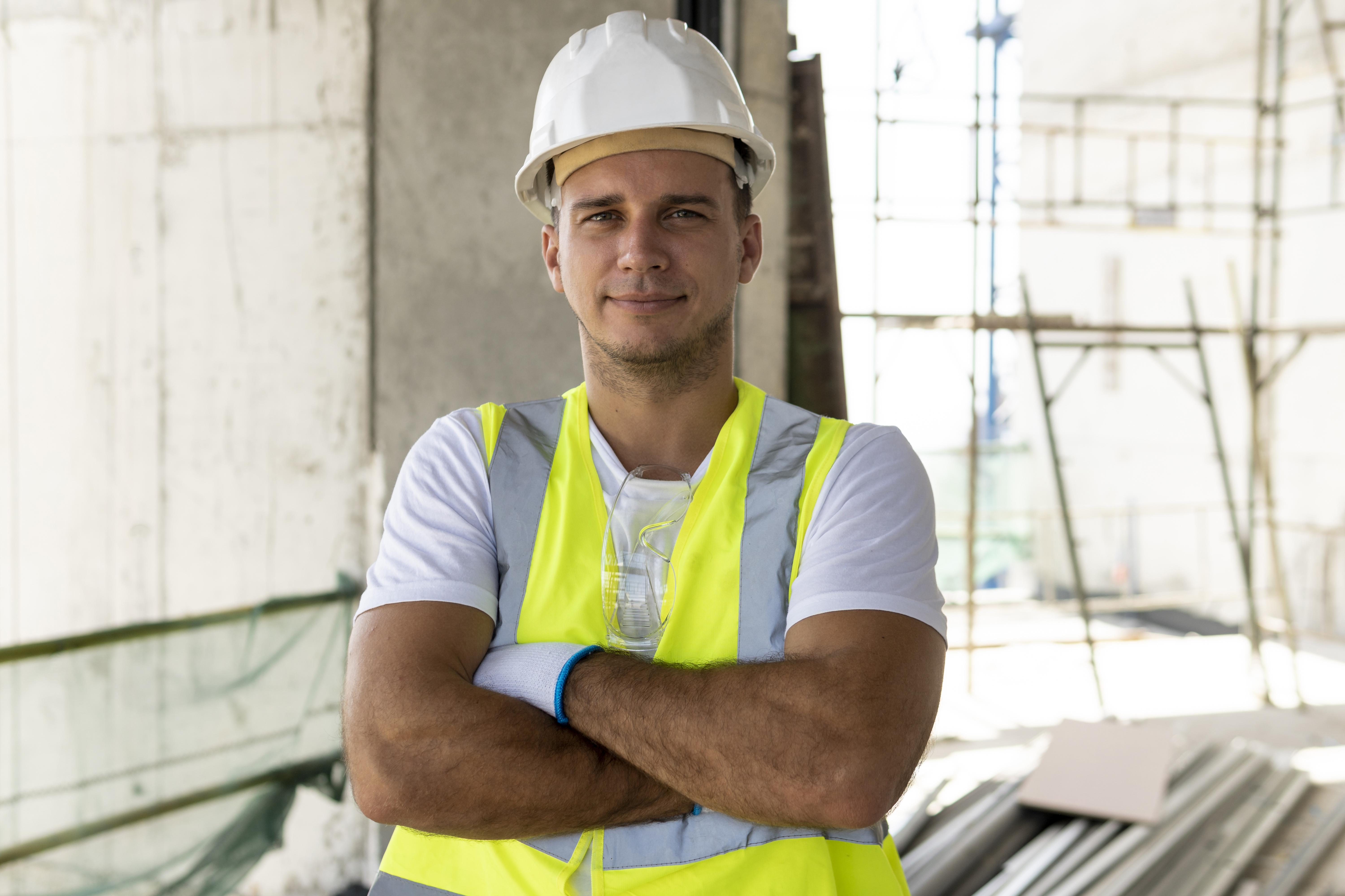 front-view-worker-construction-wearing-protection-gear.jpg
