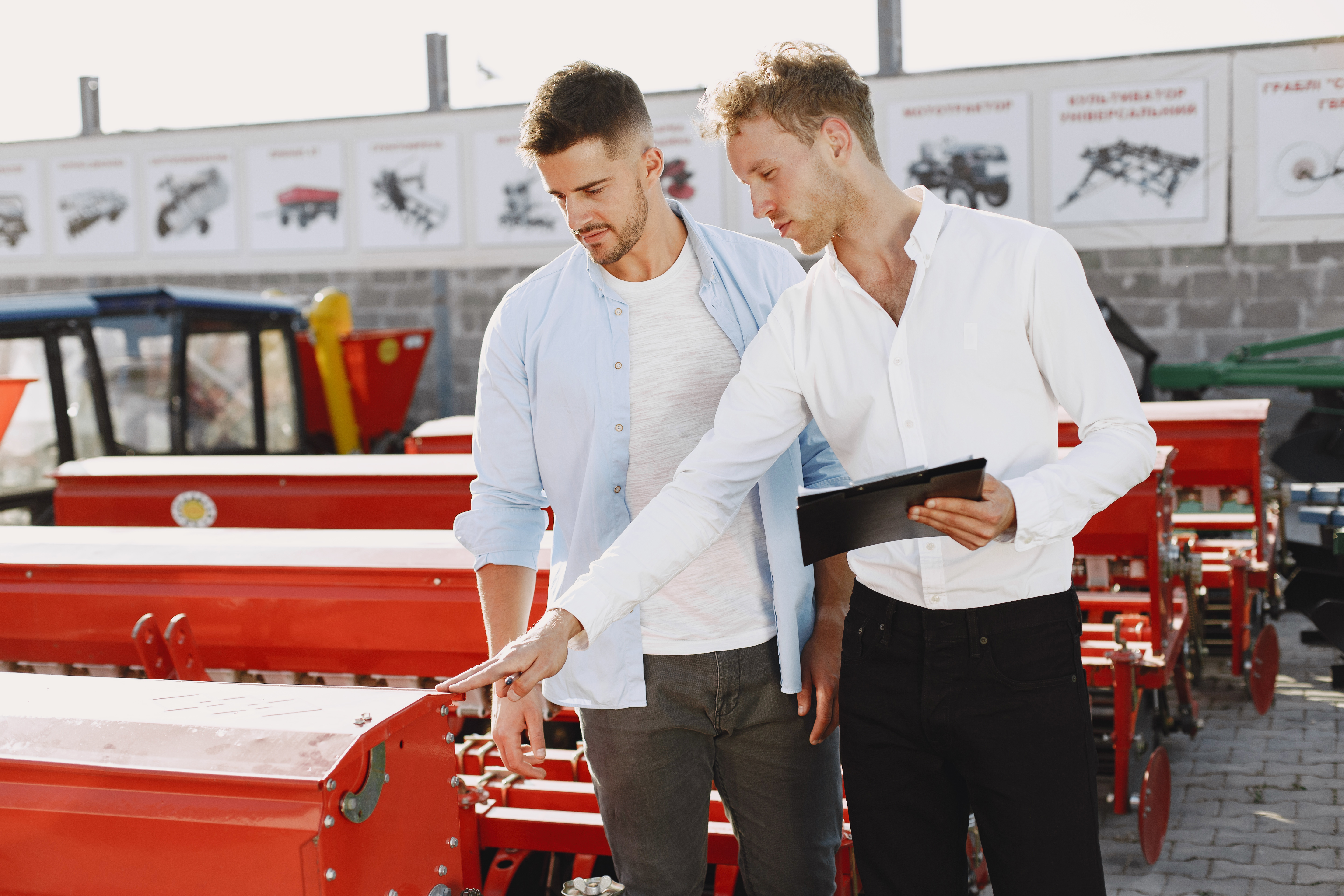 agronomist-choosing-new-planter-man-outdoor-ground-shop-agricultural-machinery.jpg