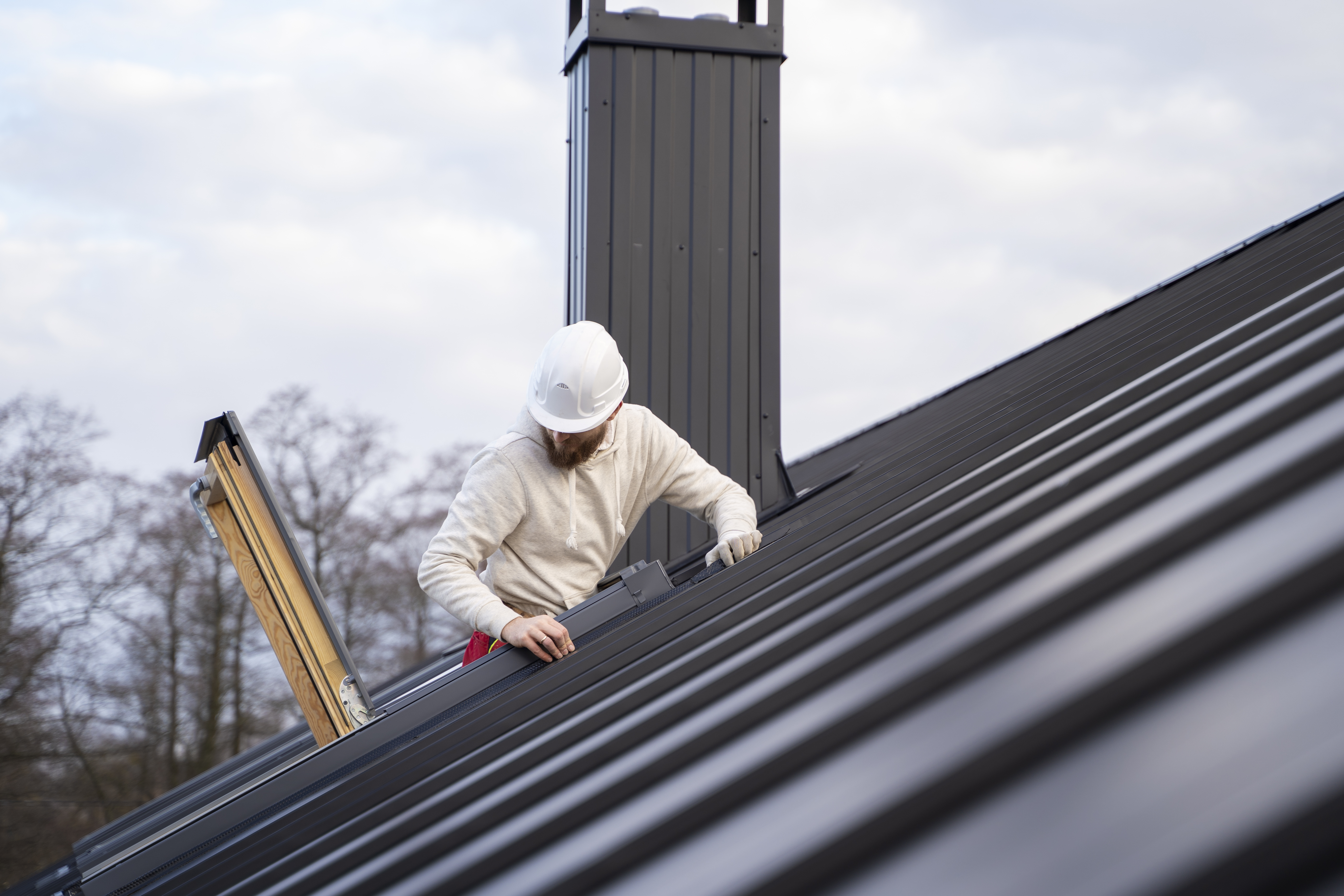 medium-shot-man-working-roof.jpg