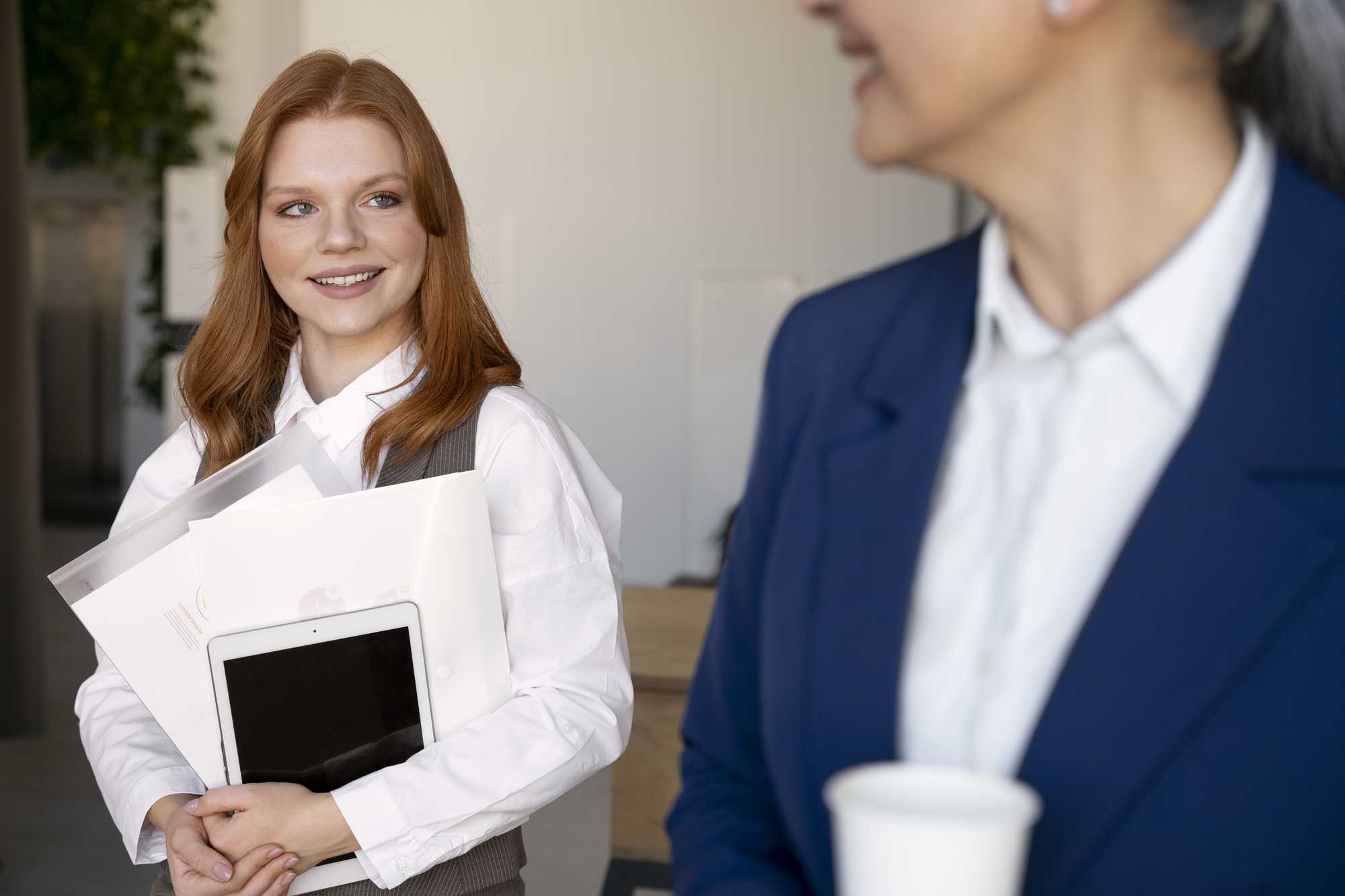 side-view-women-working-together.jpg