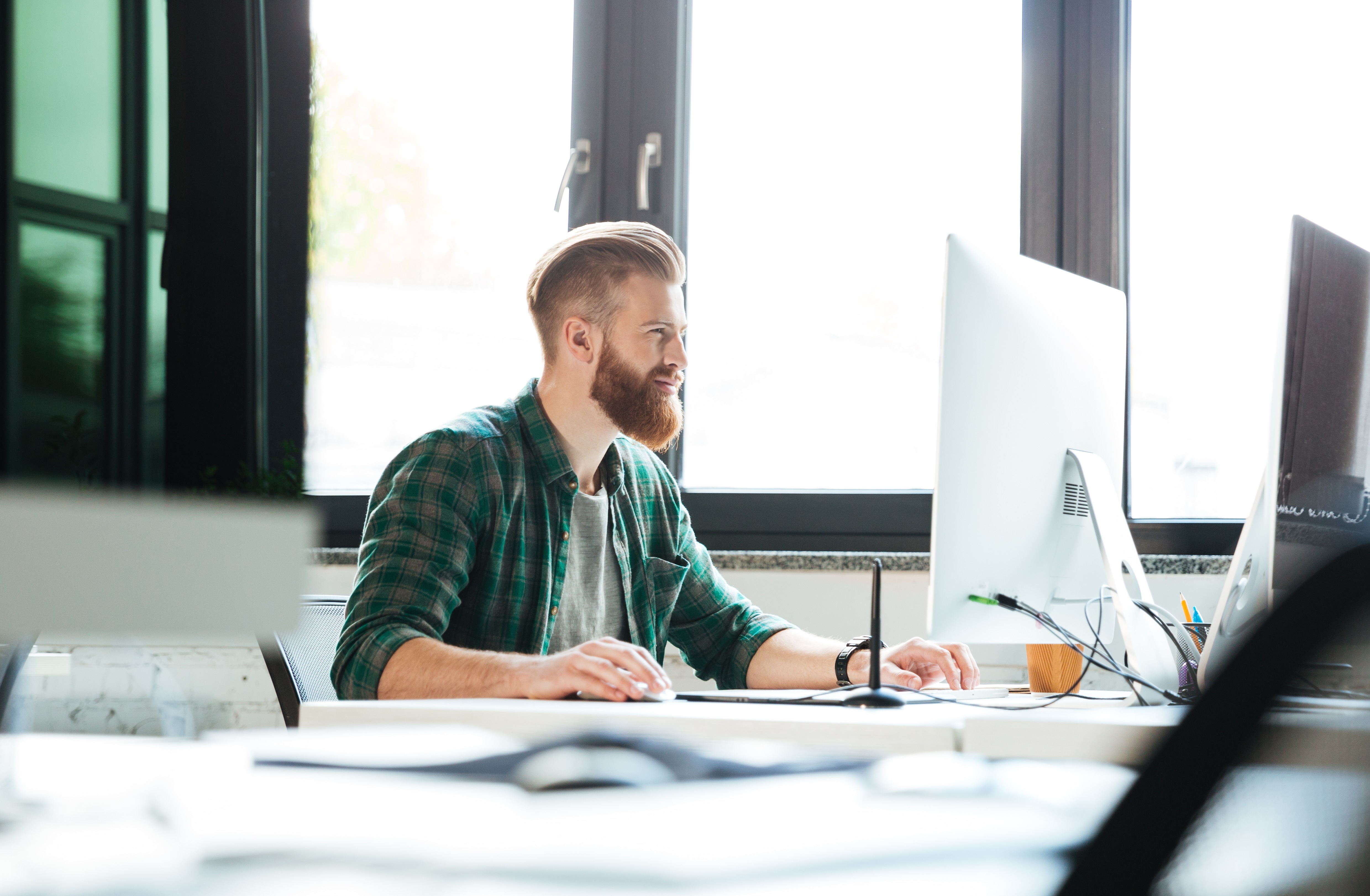 handsome-man-work-office-using-computer.jpg