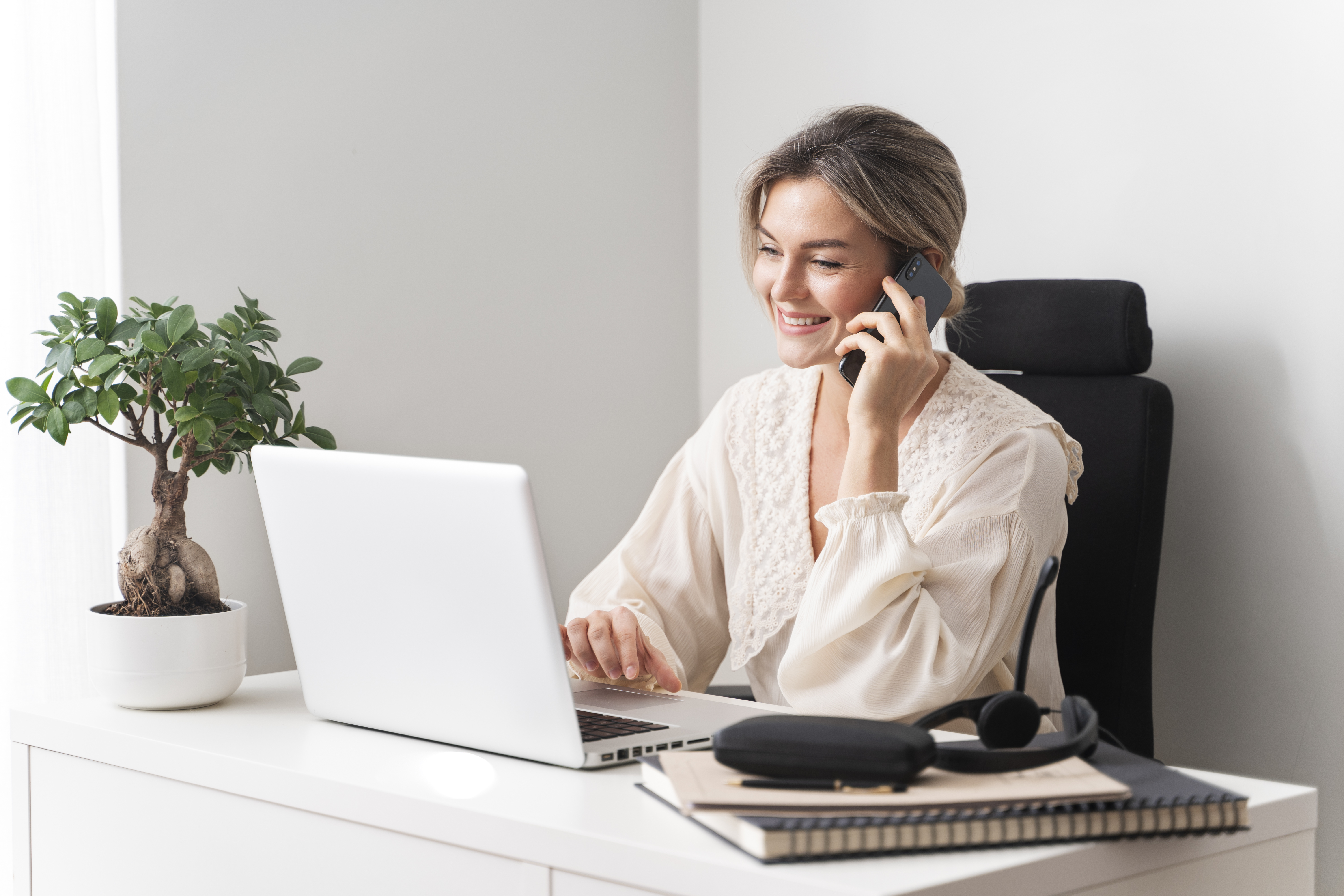 medium-shot-smiley-woman-talking-phone.jpg