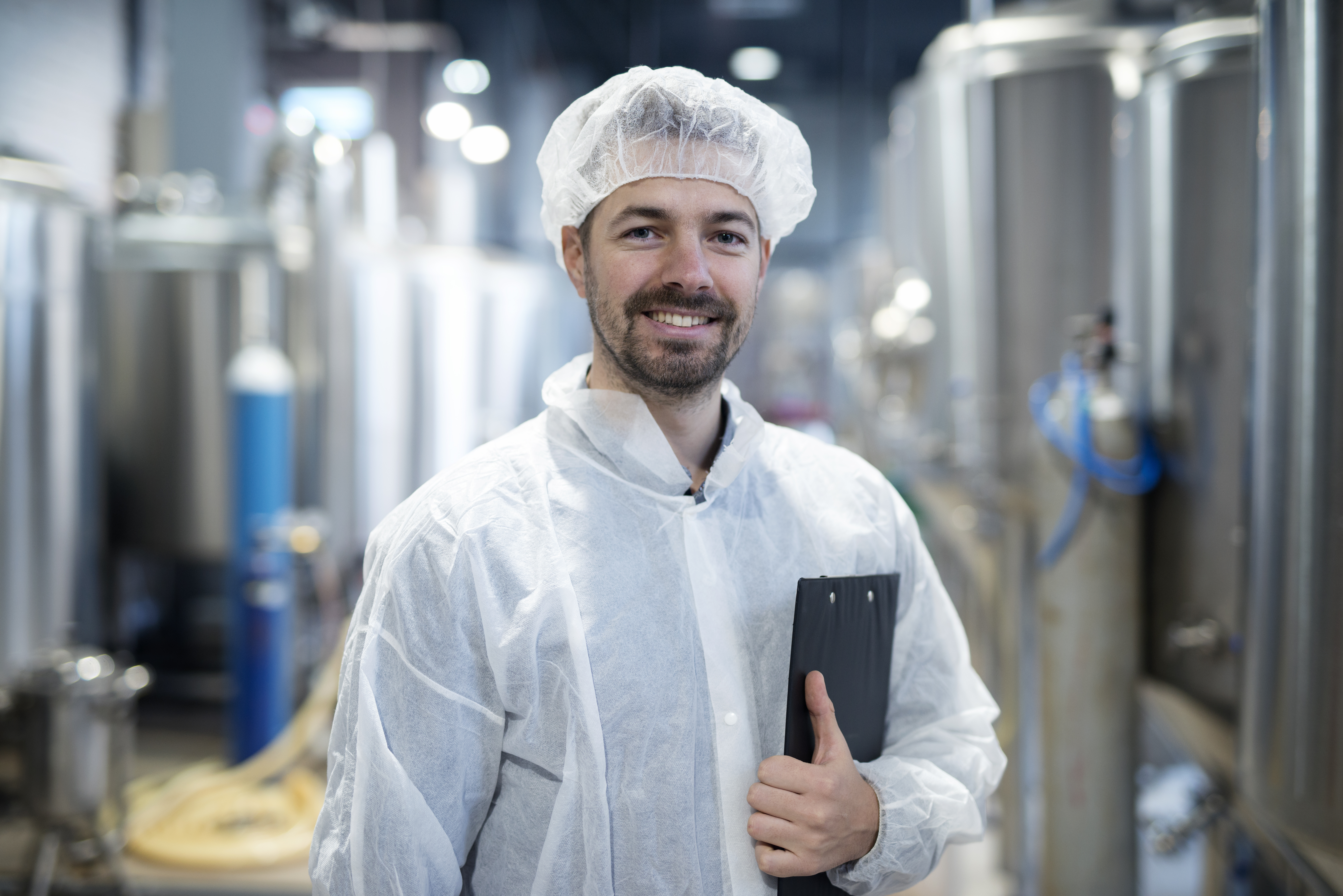 portrait-smiling-technologist-industrial-plant.jpg