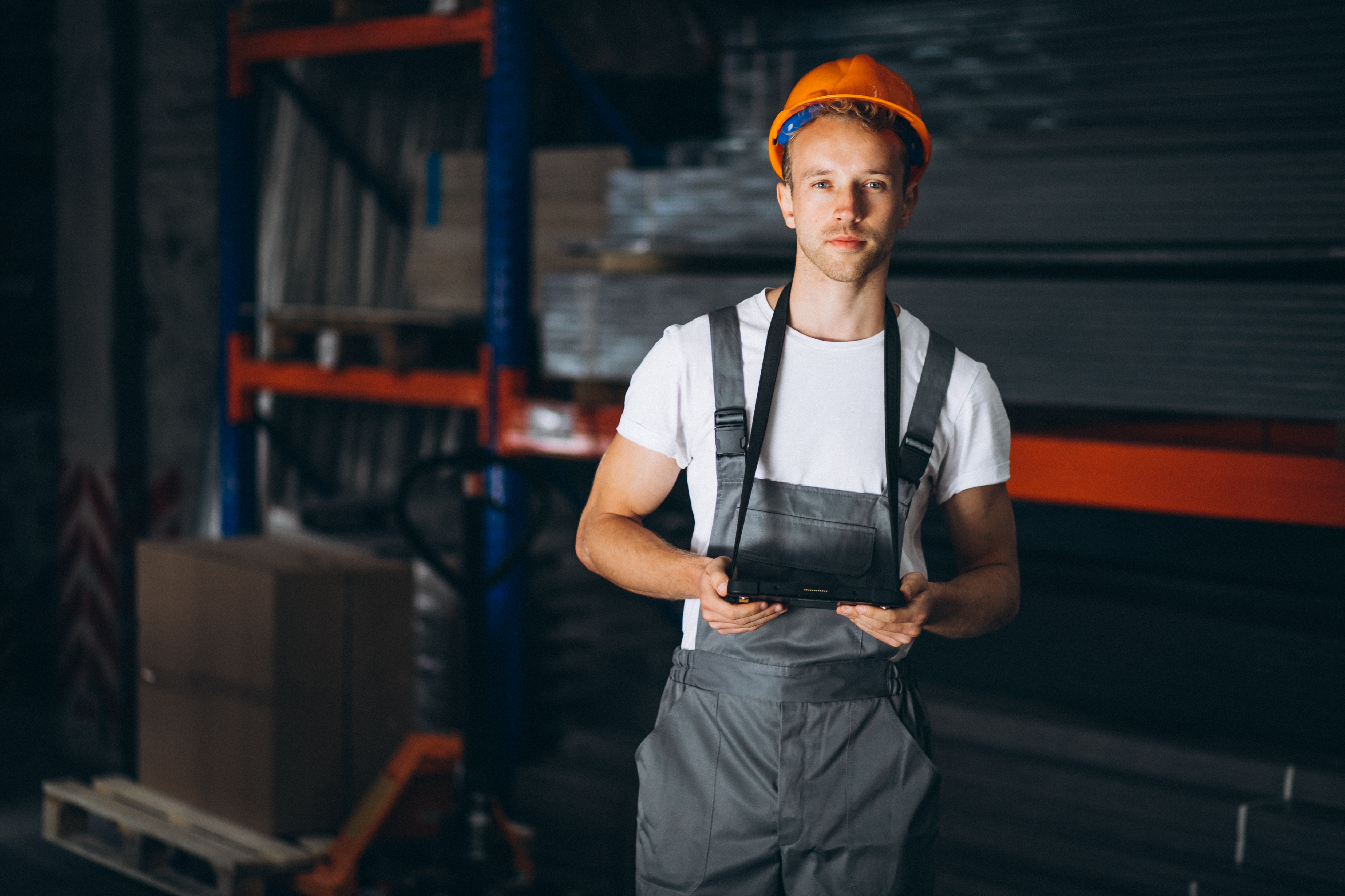 young-man-working-warehouse-with-boxes.jpg