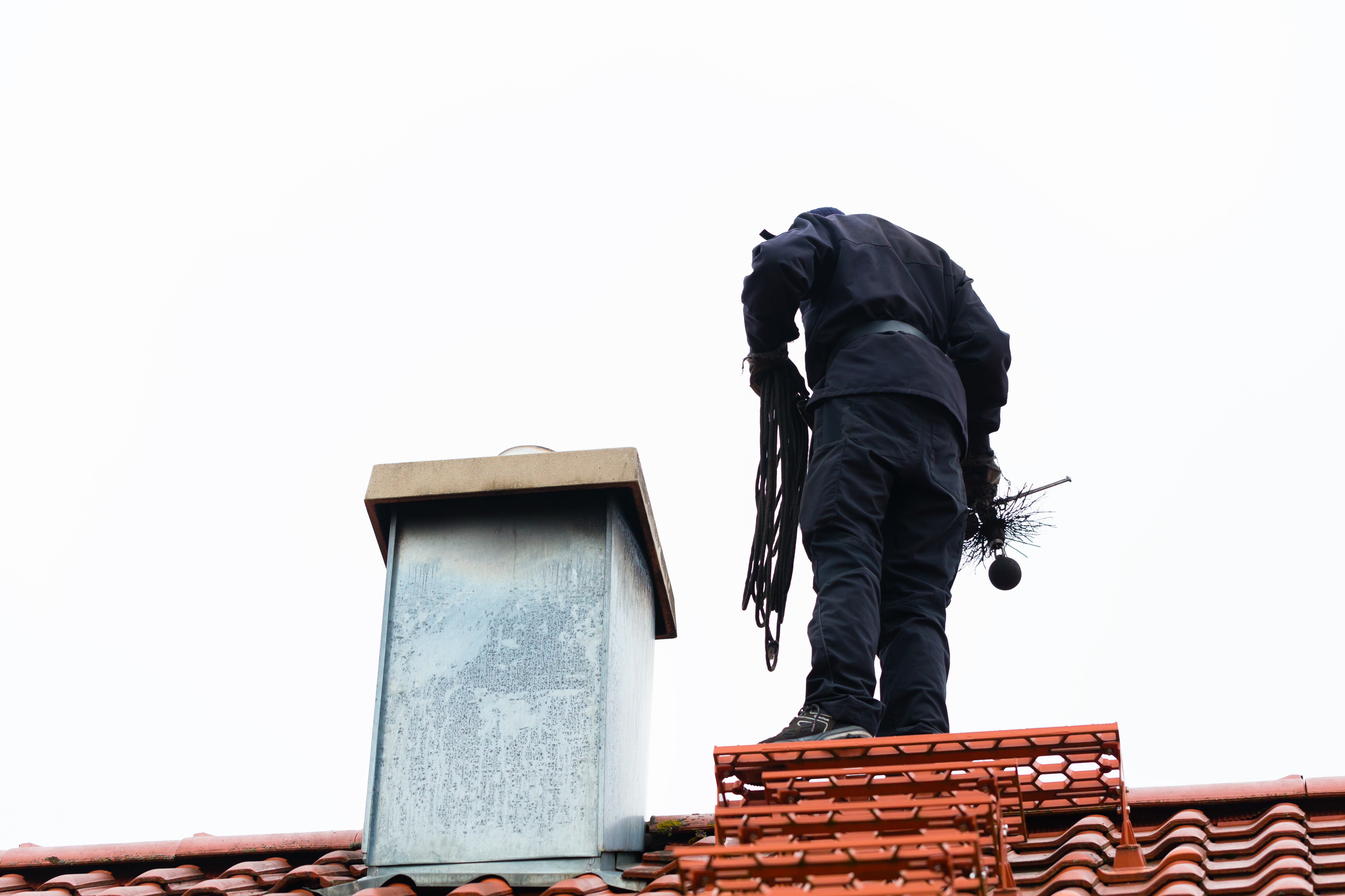 chimney-sweep-roof-home-working.jpg