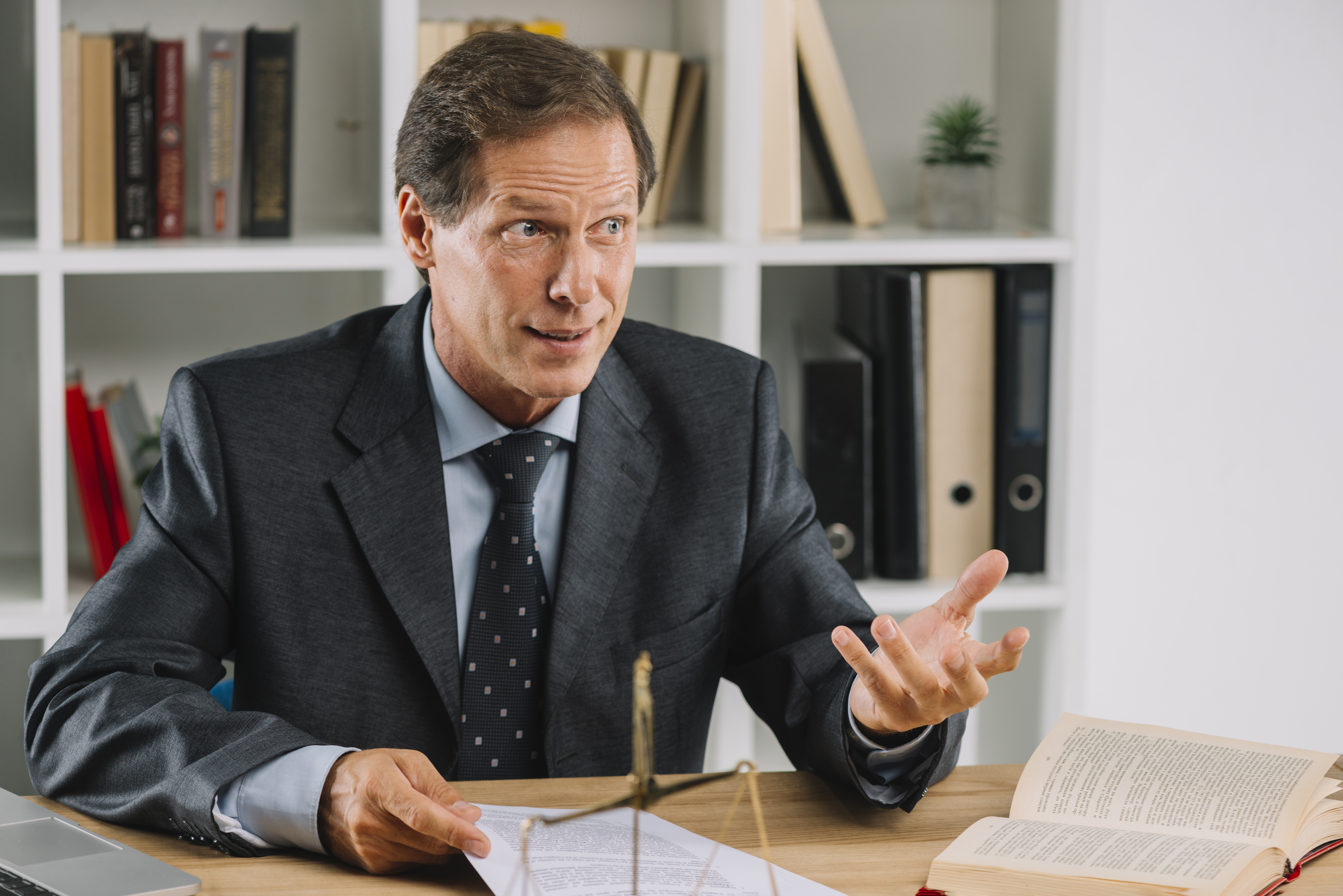 mature-lawyer-having-conversation-court-room.jpg