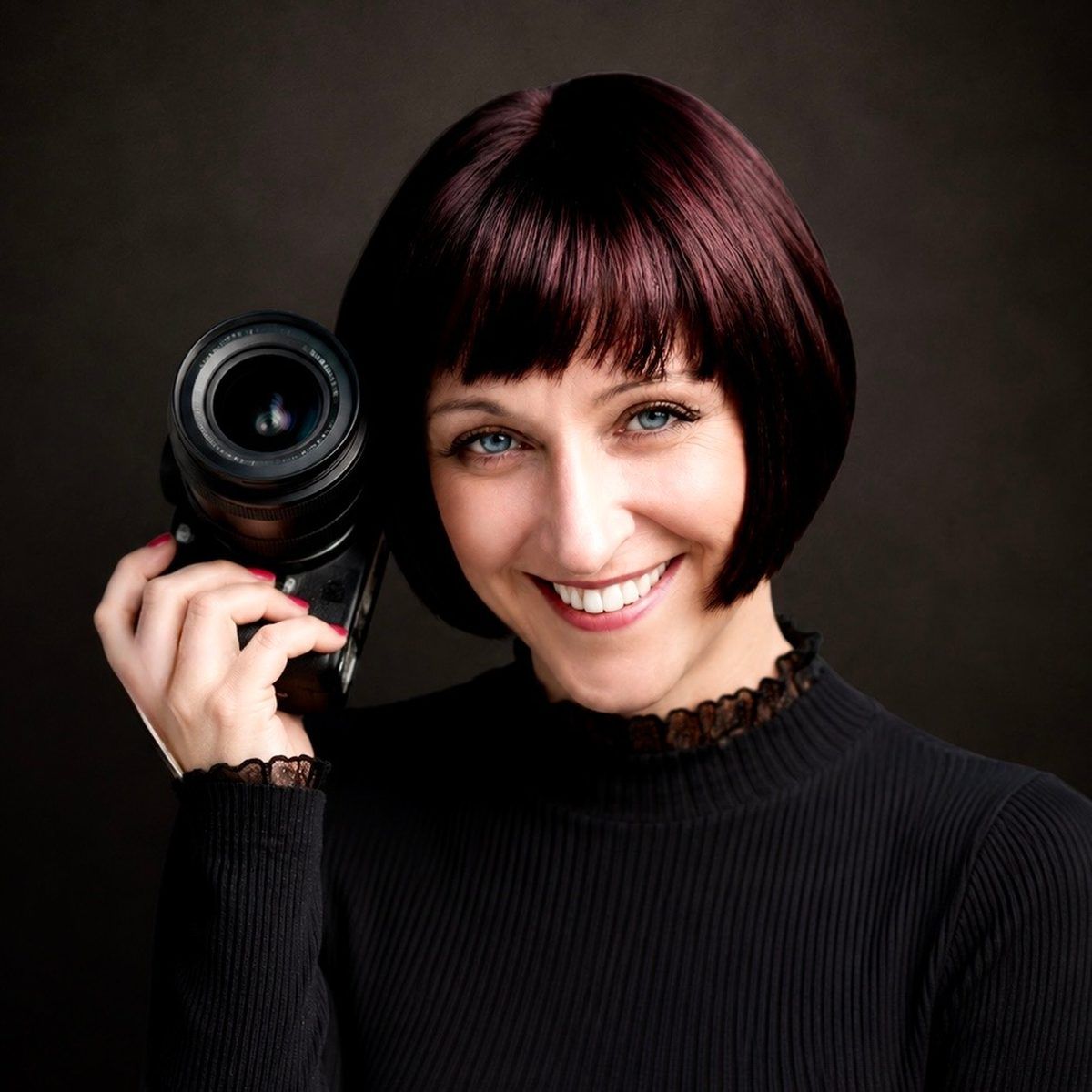 Anke Brückner, Fotogräfin, mit ihrer Kamera