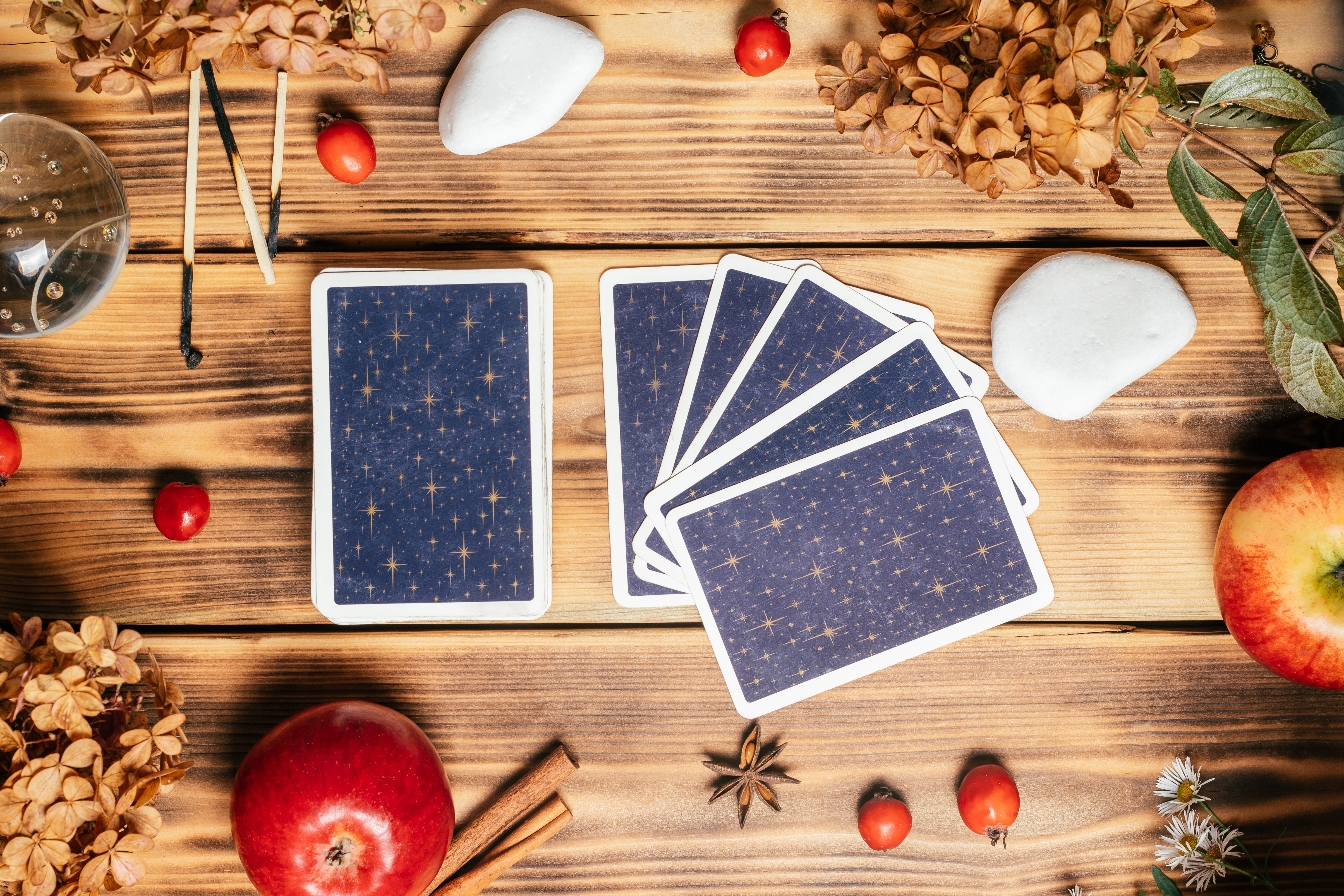tarot-cards-fanned-face-down-on-wooden-surface-wit-2025-03-10-02-39-07-utc.jpg