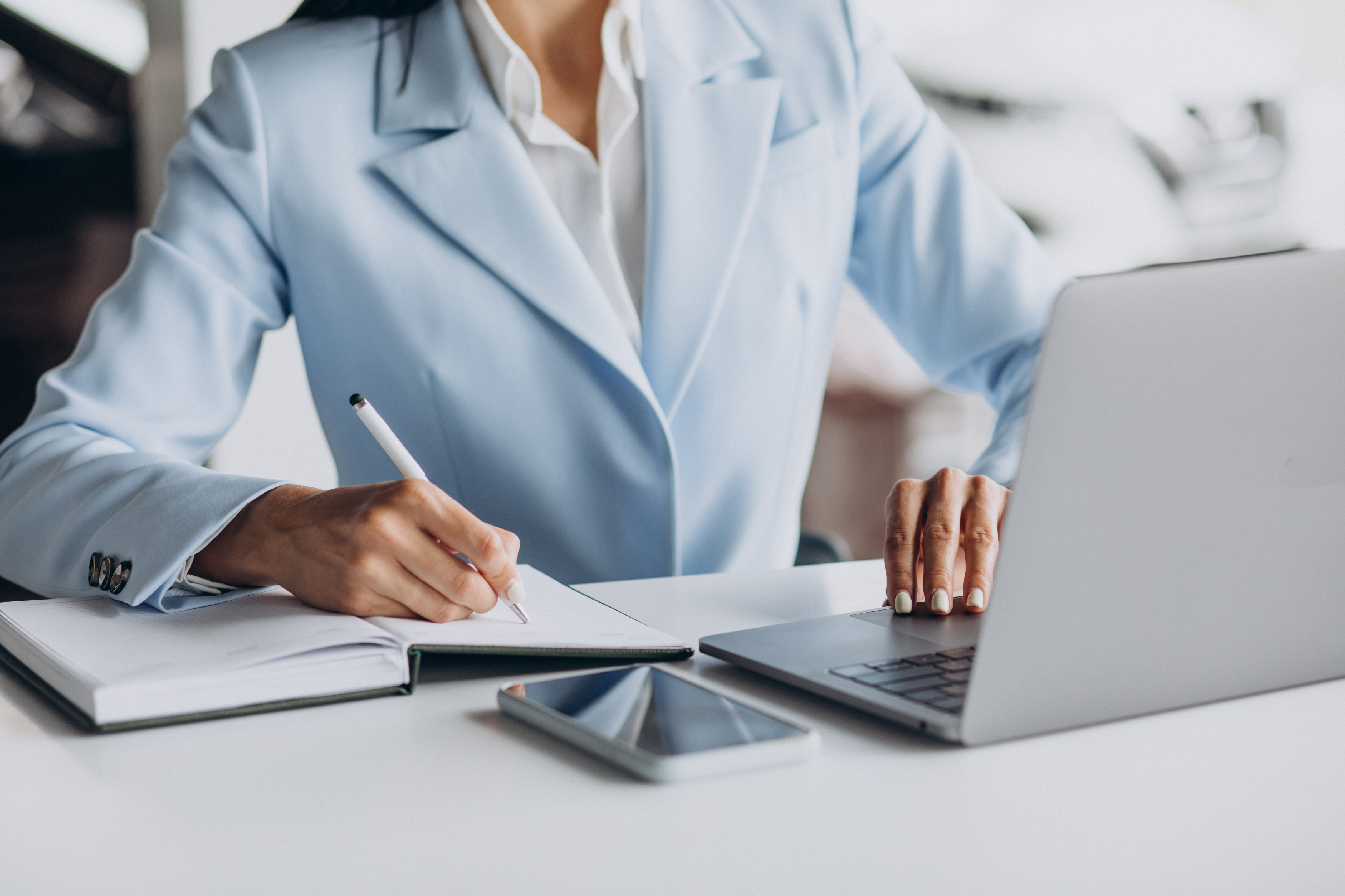 business-woman-working-in-office-on-computer(1).jpg