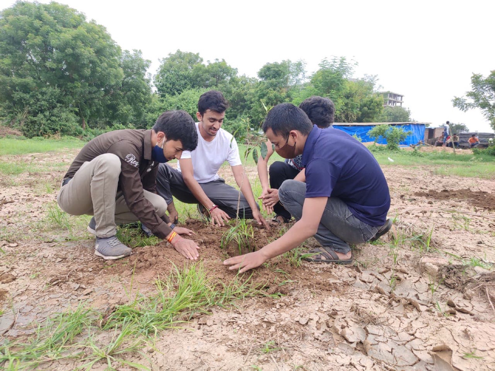 UUF team members gathered for a local tree plantation activity