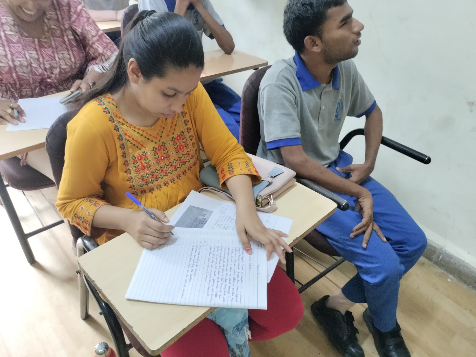 UUF writer support activity for visually impaired students