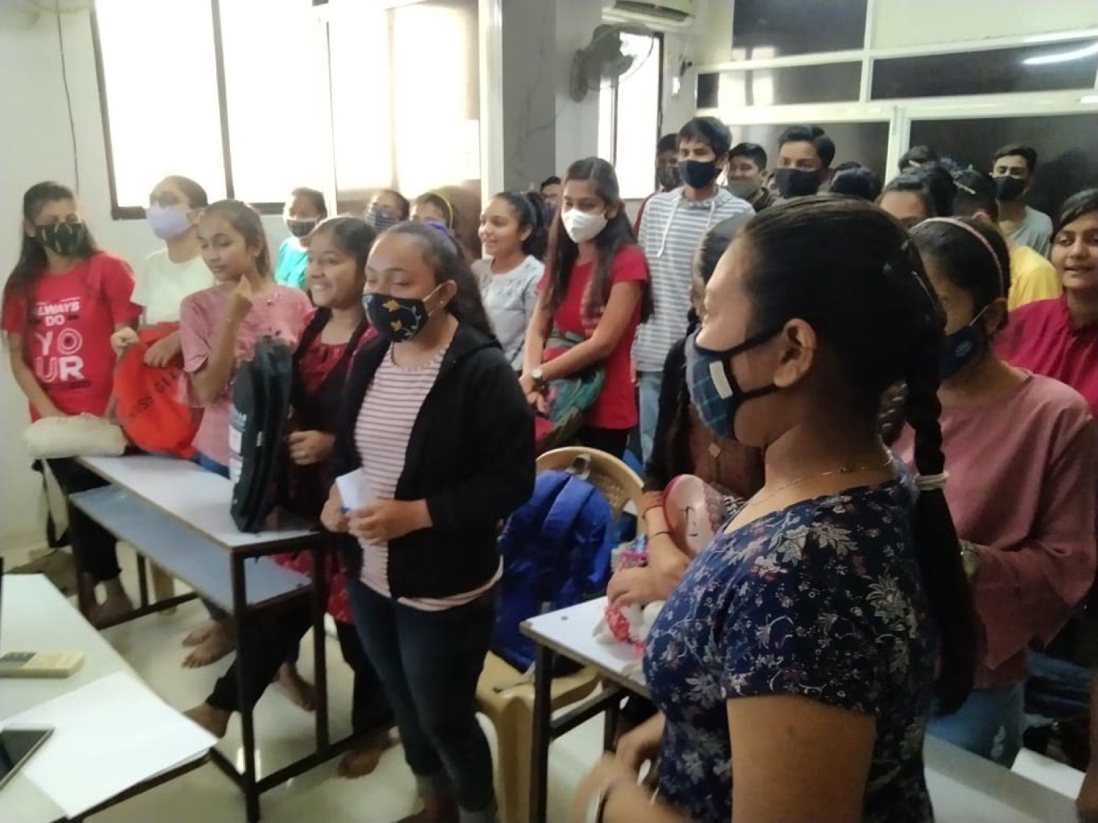 Students and UUF volunteers taking part in a classroom career discussion