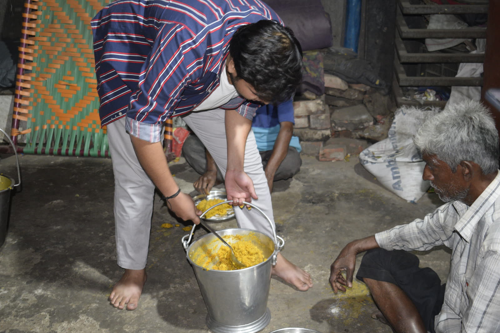 UUF volunteers serving meals during a community food drive