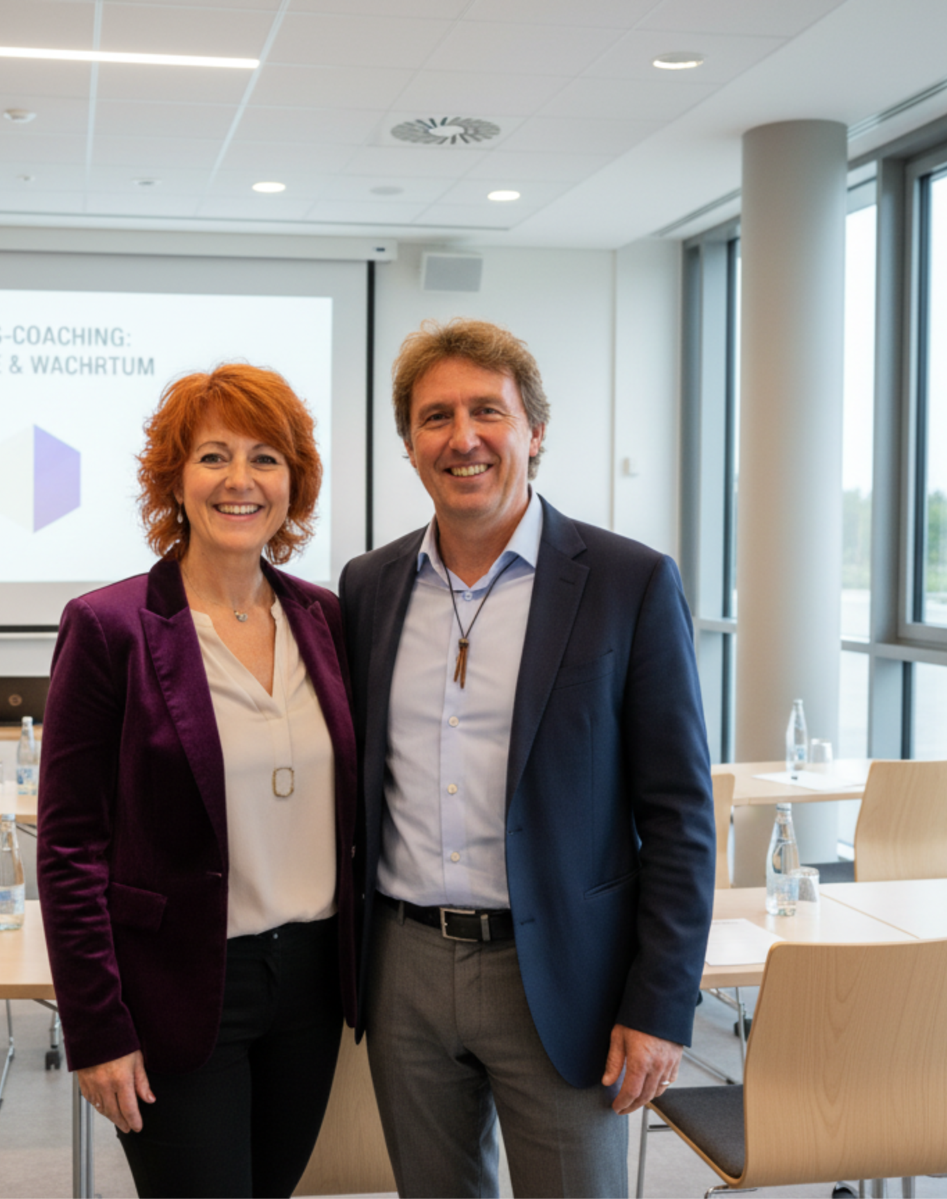 Markus und Susana Kessler hübsch angezogen mit grünem Hintergrund