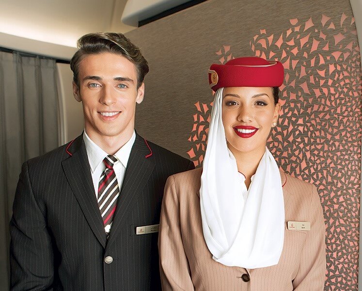 2 flight attendants from the airline emirates, one woman and one man