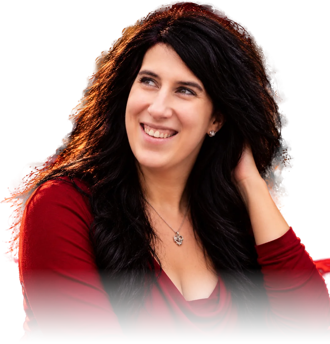 Christiane Braas, Businessdesignerin, lächelnd im roten Oberteil