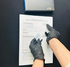 Behandlungsdokumentation zum IRI® Filler-System mit Unterschrift der Kundin und Chargennummer