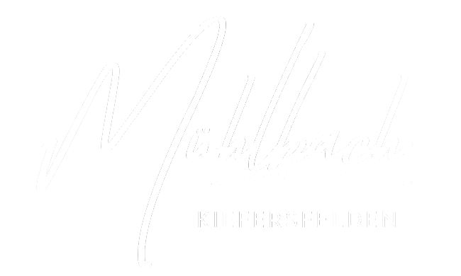 logo_muehlbach_web_weiss.png